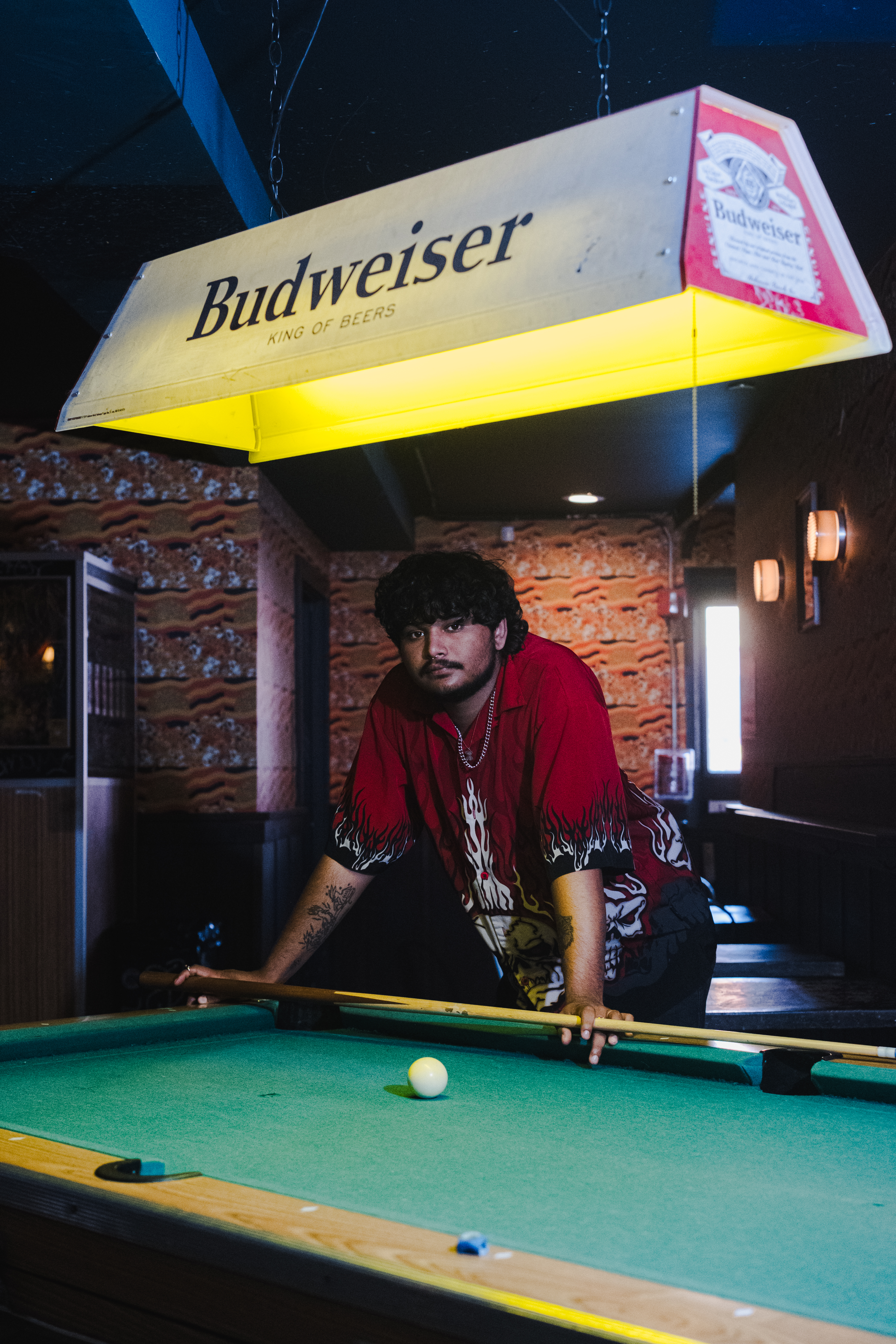 Vidhu Kota reviewing footage on set